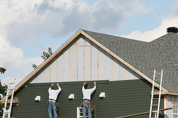 Professional Siding Installation technician working in Newport, OR